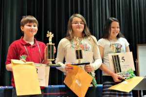 Winners of the JCS Elementary Spelling Bee. Pictured, left, 3rd place winner, Jacob Ellis (Four Oaks Elementary); 1st place winner, Ariana Arbelaez (Cooper Elementary); and 2nd place winner Whitley McCoy (Princeton Elementary). ​