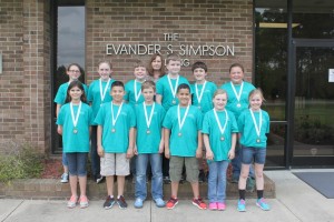 Meadow School Battle of the Books team members.From left,  front row,  Jada Barefoot, Jaleel Carranza, Elliot Butler, Jared Carranza, ReaganWilliford, and Lyda Boone. Middle row, Emma Stewart, Kaitlyn Giddens, Braden Raynor, Adam Miller, Preston Parker, and Anna Knowles. Back row,  BOB Coach Heather Sutton.