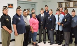 Pictured from left to right are: 1st Vice Commander Eugene “Beanie” Eckerson. Sgt-at-arms Ken Stith & Larry Tice, Post Service Officer Deloy Shaw, Finance Officer Cynthia Shaw, Judge Advocate Percy Liles, Chaplain Joe Hester, 2nd Vice commander David “Slammer” Sammons (rear), Adjutant Ken Parker, Past commander Rudolph Allen, Post Historian Gene Karaszewski (rear), Post-71 Commander Devell “Bull” Durham and Post Building and grounds officer Ken Wendel.
