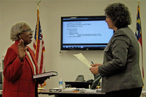 Jackie Lacy receives her oath as mayor pro tem from Clerk of Court Michelle Ball.