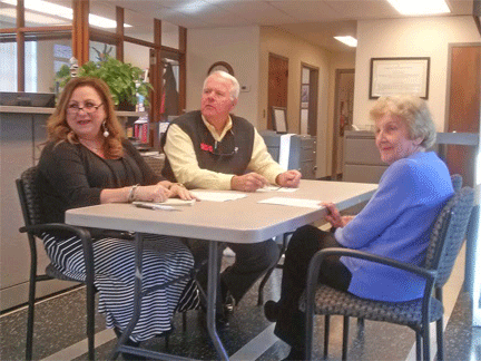 (Left to right) Johnston County Board of Elections Director Leigh Anne Price and election board members John Shallcross and Pat Proctor at Tuesday’s meeting. The meeting was postponed until Thursday at 2:00 PM after a board member called in sick and was unable to attend. JoCoReport.com Photo
