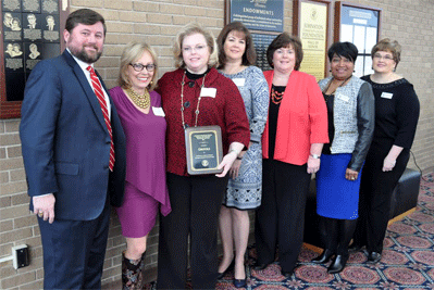 From left are Scott Parrish, president, JCC Foundation Board of Directors; Lyn Austin, chair of the JCC Board of Trustees; Amy Durham, director of quality at the Grifols Clayton site; Blaire Narron, manager of performance development at Grifols; Suzanne Johnson, director of human resources at Grifols; Jean Barnes, administrative associate to the Clayton site president and JCC Foundation Board of Directors; and Dee Dee Daughtry, vice president of instruction at JCC