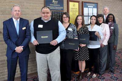From left are Jeff Pope, JCC Foundation member; Graham Sanders of Four Oaks; Laura Rose of Benson; Jennifer Pilkington of Brogden; and Jessica Leon of Benson; Teresa McCall, SECU advisory board member; Letitia Rawlison, director of extension programs at JCC; and Jay Greenstock, vice president/city officer for SECU in Smithfield.