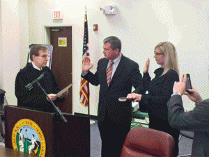 Riverwood Middle School teacher Caroline Daily (right) is sworn in to the Governor’s Task Force on Safer Schools by state Supreme Court Justice Bob Edmunds (left). Also pictured is Jeff White, a Halifax County public school administrator. 