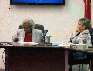 (Right to left) Selma Mayor Cheryl Oliver and Mayor Pro-Tem Jacqueline Lacy listen to discussions about a new 3.99 million gallon fuel tank during the May meeting of the Selma Town Council. JoCoReport.com Photo