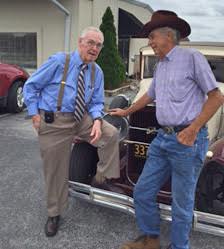 WTSB’s Carl Lamm (left) poses with Lizard Lick Mayor Woody Wood in front of Wood's 1931 Buick.