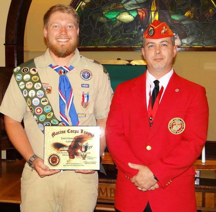 (Left to right) William “Kyle” Walker of Boy Scout Troop 210 of McGee’s Crossroads receives the Eagle Scout Good Citizenship Award from Lewis W. Rice III from the Johnston County Marine Corps League Carry-On Detachment. 