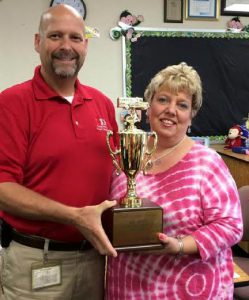 Johnston County Schools Executive Director of Transportation Services and Growth Planning (left) recognizes Shannon Brock (right) as the 2015-2016 Driver of the Year.
