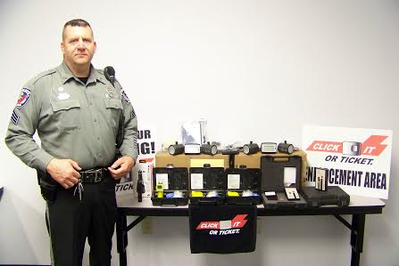 Sgt. T.L. Avery stands with $9,000 worth of equipment received this week by the Selma Police from the Governors Highway Safety Program. JoCoReport.com Photo
