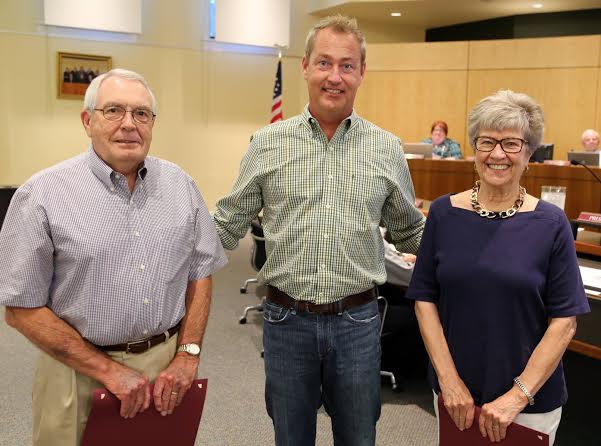 From left to right: Hubert Schmidt, Mayor McLeod, and Judith Schmidt