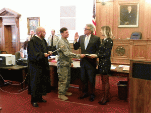 Commissioner Jeff Carver takes his Oath of Office from Resident Superior Court Judge Thomas Lock on Monday during ceremonies at the Johnston County Courthouse. Carver was reelected in November to his fifth term. JoCoReport.com Photo