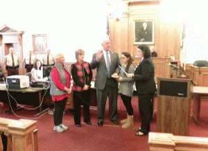 Mike Wooten of Princeton receives his Oath of Office to the Johnston County School Board from Clerk of Court Michelle Ball. Wooten won his third term on the school board in November.   JoCoReport.com Photo